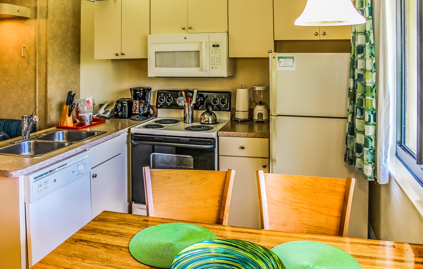 A fully equipped kitchen at VRI's Hollywood Sands Resort in Hollywood, Florida.